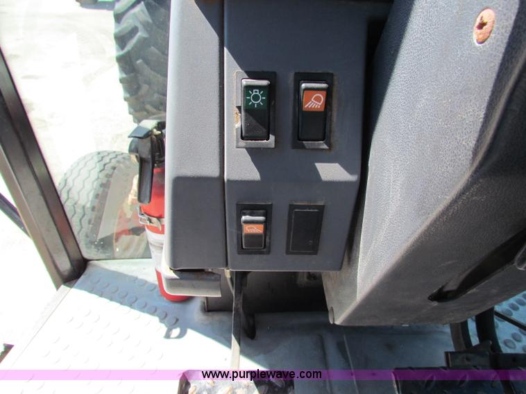 image for item G4779 1996 New Holland 6640SL tractor