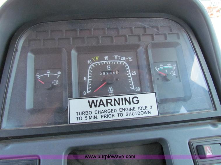 image for item G4780 2000 New Holland TS100 tractor