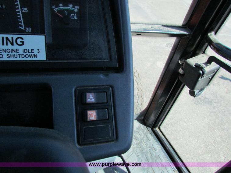 image for item G4780 2000 New Holland TS100 tractor