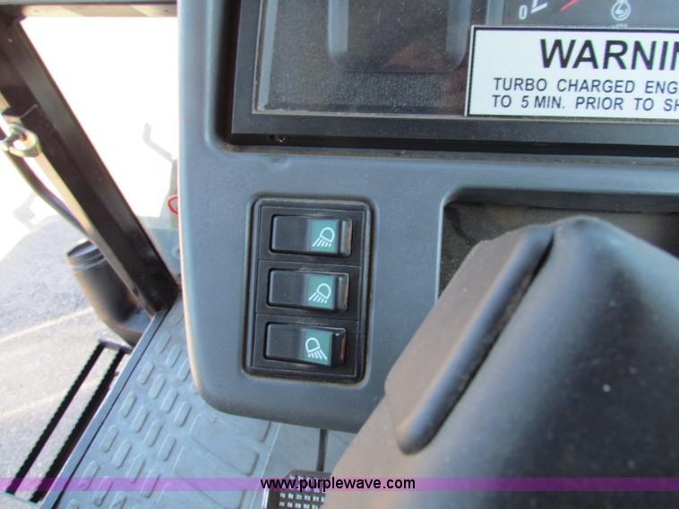 image for item G4780 2000 New Holland TS100 tractor