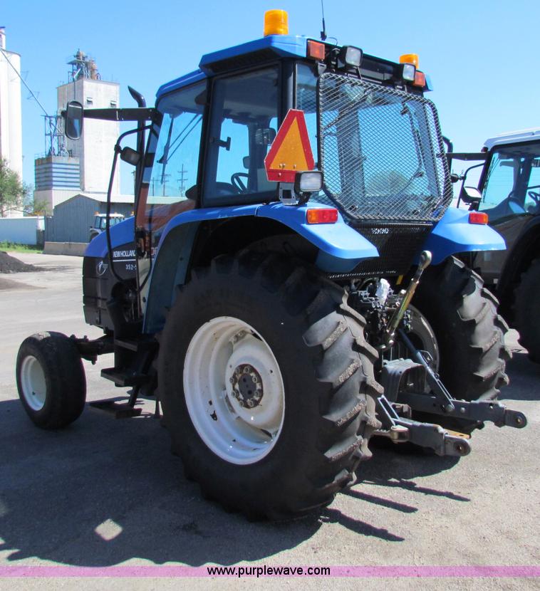image for item G4784 2002 New Holland TS100 tractor