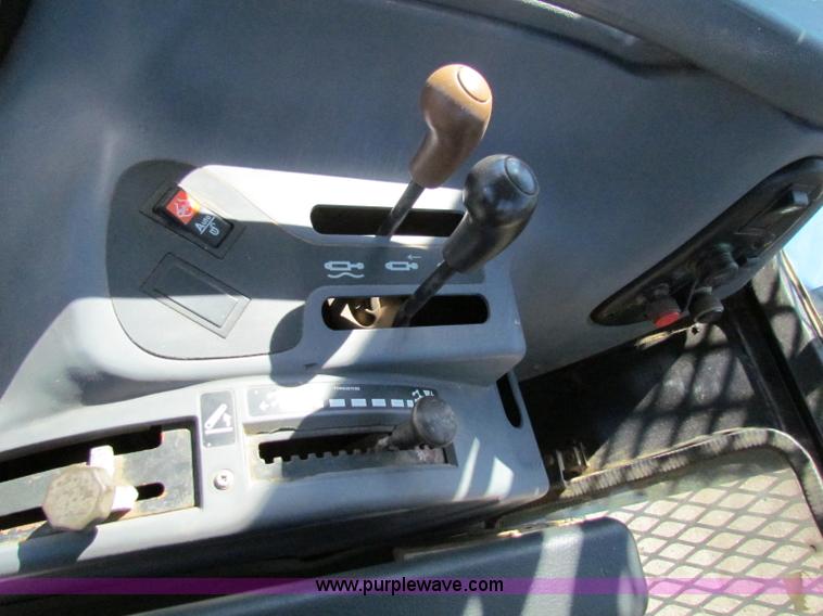 image for item G4784 2002 New Holland TS100 tractor