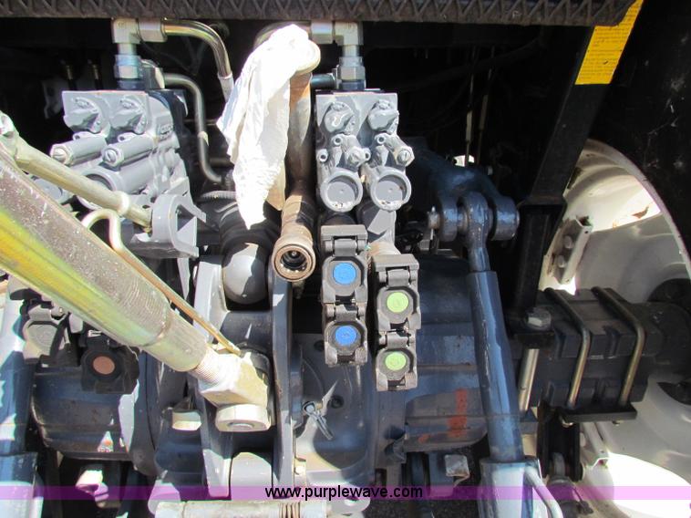 image for item G4784 2002 New Holland TS100 tractor