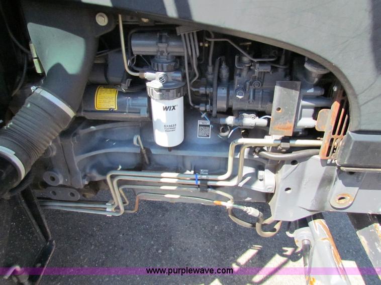 image for item G4784 2002 New Holland TS100 tractor