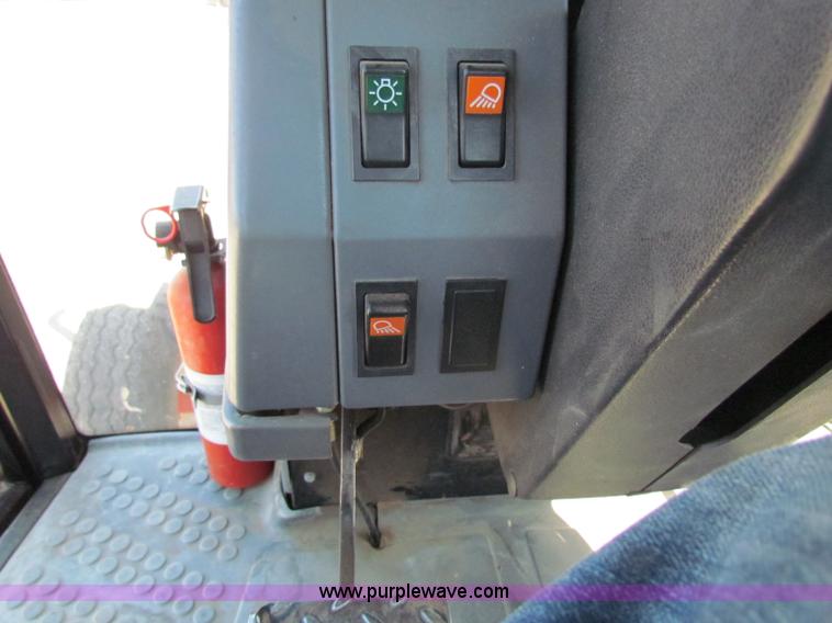 image for item G4785 1996 New Holland 6640SL tractor