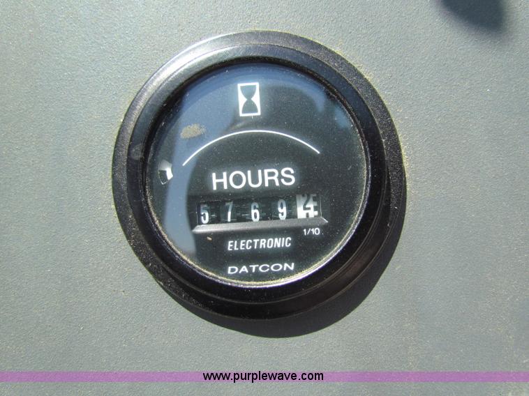 image for item G4786 1998 New Holland 6640SL tractor