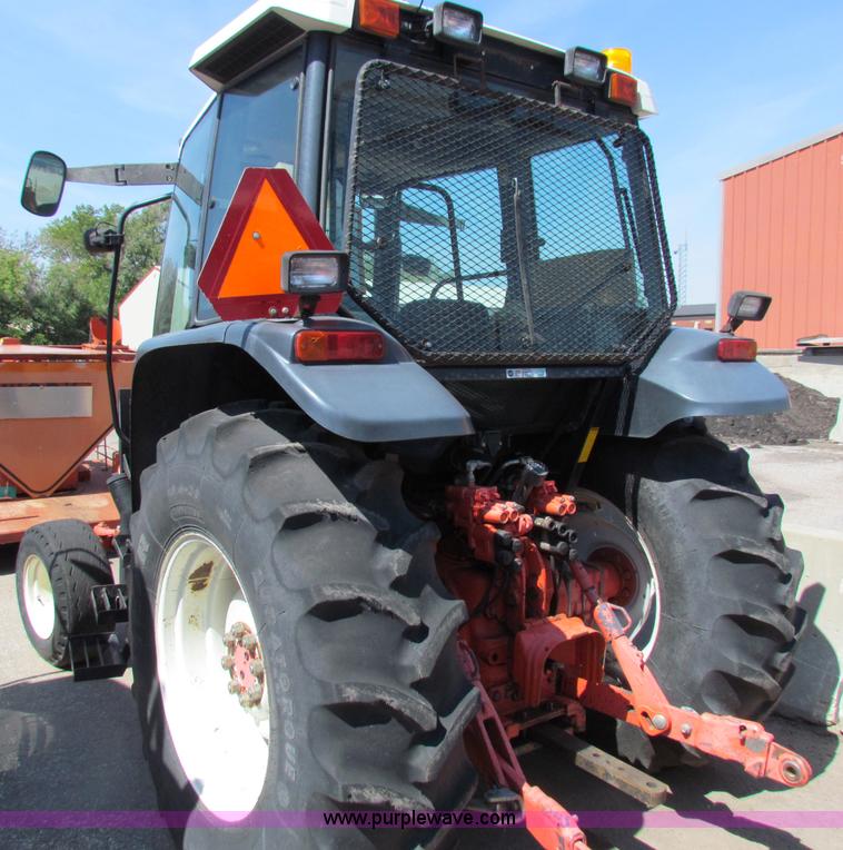 image for item G4787 1999 New Holland TS100 tractor