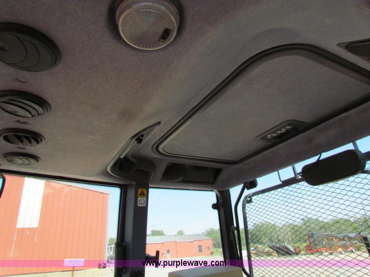 image for item G4787 1999 New Holland TS100 tractor