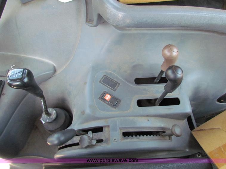 image for item G4787 1999 New Holland TS100 tractor