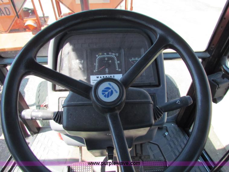 image for item G4787 1999 New Holland TS100 tractor
