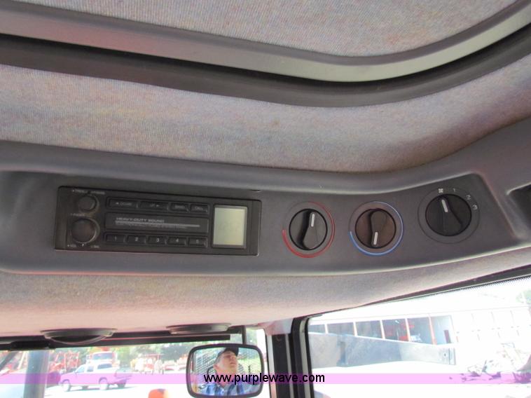 image for item G4787 1999 New Holland TS100 tractor