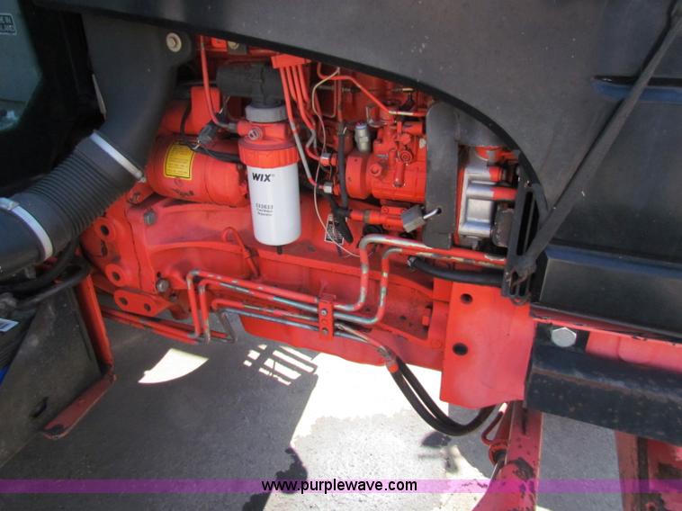 image for item G4787 1999 New Holland TS100 tractor