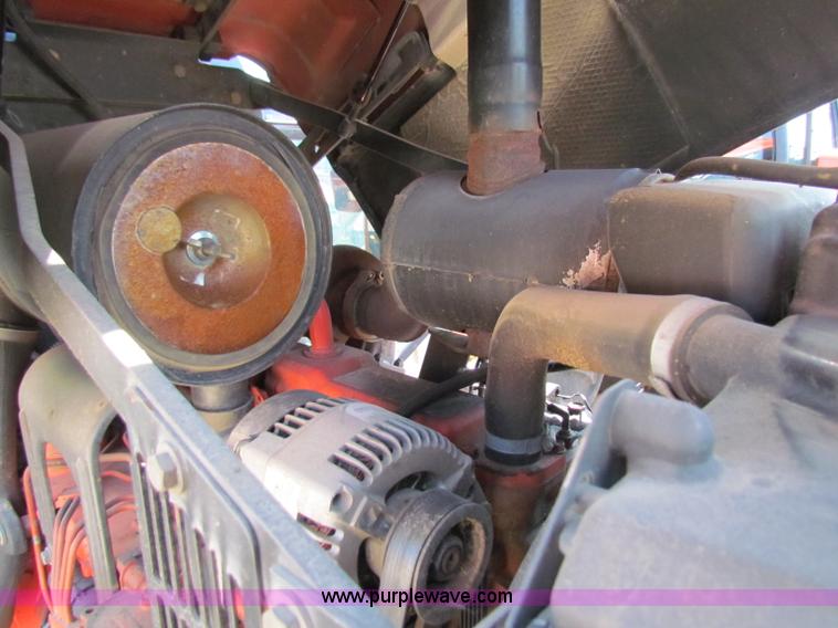 image for item G4787 1999 New Holland TS100 tractor