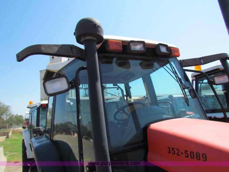 image for item G4787 1999 New Holland TS100 tractor