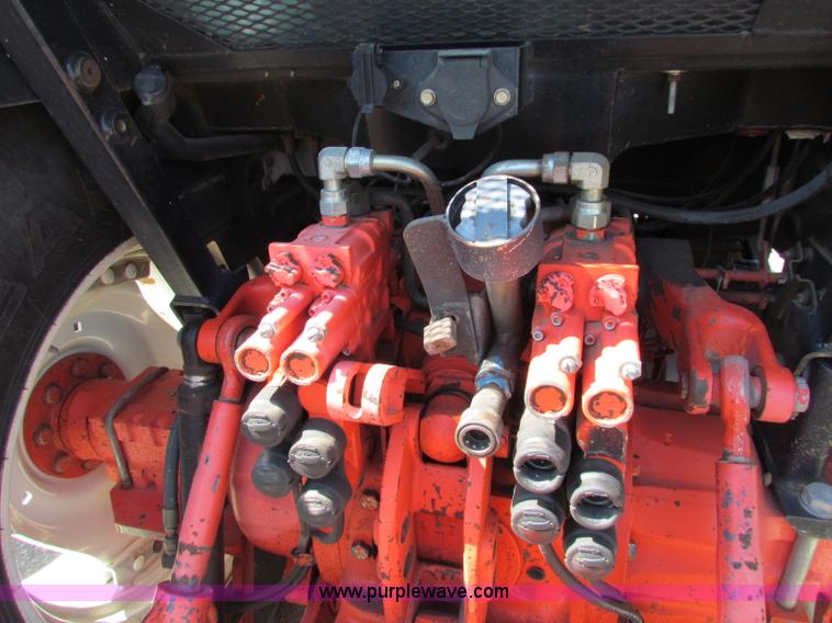 image for item G4787 1999 New Holland TS100 tractor