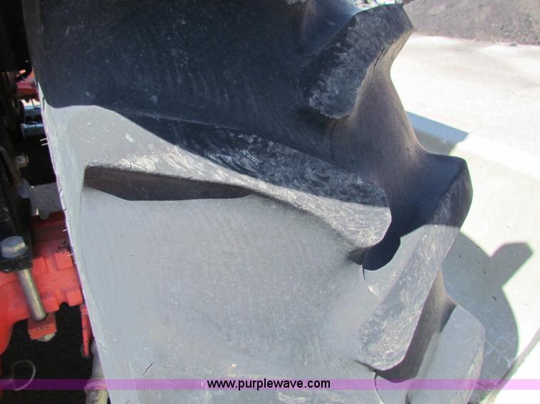 image for item G4787 1999 New Holland TS100 tractor