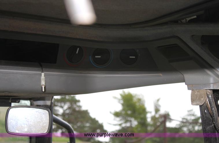 image for item G4792 1998 New Holland 6640SL tractor