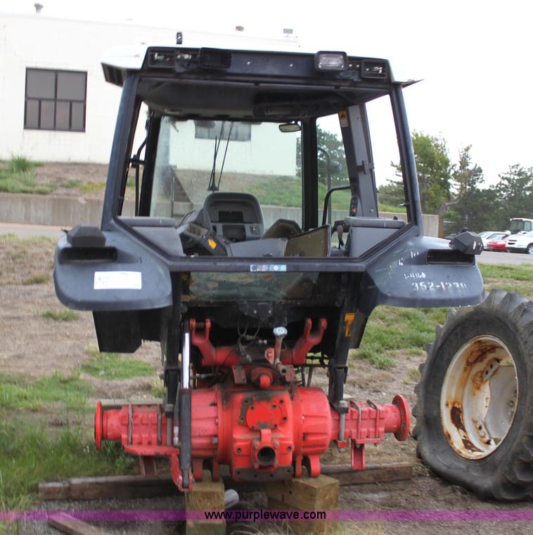 image for item G4793 1999 New Holland TS100 tractor