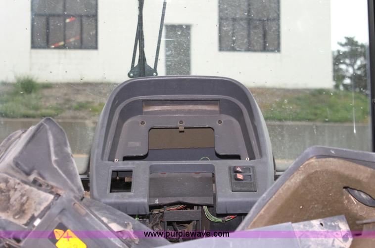 image for item G4793 1999 New Holland TS100 tractor