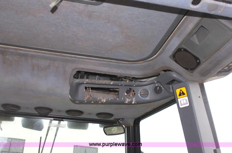 image for item G4793 1999 New Holland TS100 tractor