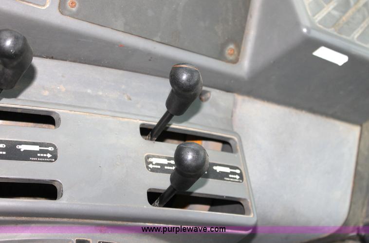 image for item G4795 1996 New Holland 6640SL tractor