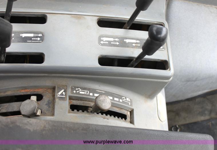 image for item G4813 1996 New Holland 6640SL tractor