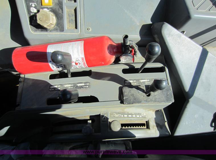 image for item G4814 1998 New Holland 6640SL tractor