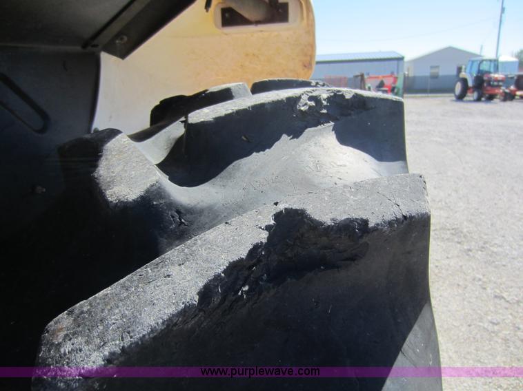 image for item G4815 1997 New Holland 6640SL tractor