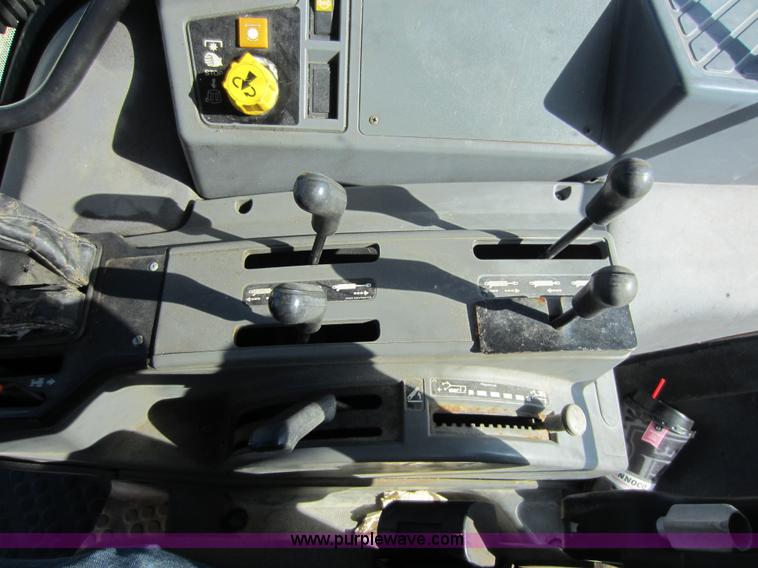 image for item G4815 1997 New Holland 6640SL tractor