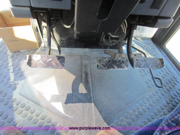 image for item G4815 1997 New Holland 6640SL tractor