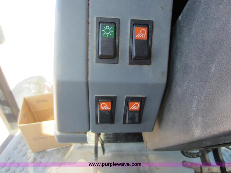 image for item G4815 1997 New Holland 6640SL tractor