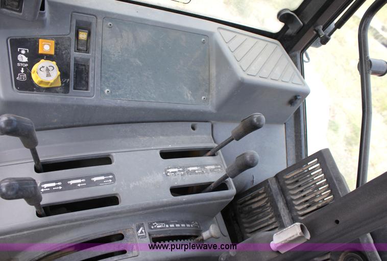 image for item G4853 1998 New Holland 6640SL tractor