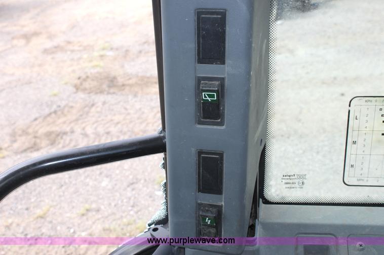 image for item G4853 1998 New Holland 6640SL tractor