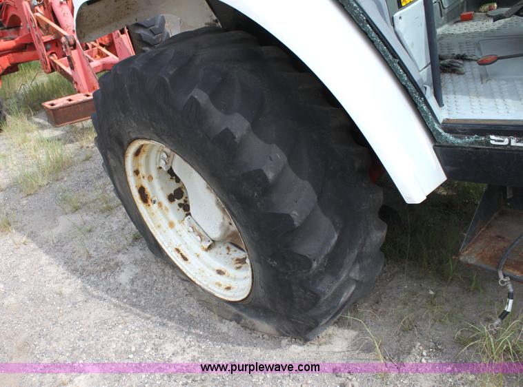 image for item G4853 1998 New Holland 6640SL tractor