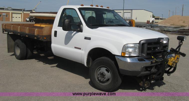 image for item B8133 2003 Ford F350 XL Super Duty flatbed pickup truck