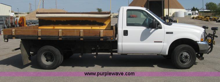 image for item B8133 2003 Ford F350 XL Super Duty flatbed pickup truck