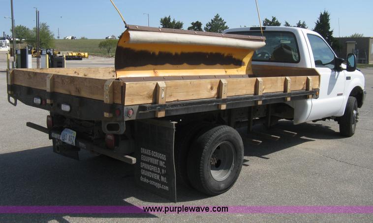 image for item B8133 2003 Ford F350 XL Super Duty flatbed pickup truck