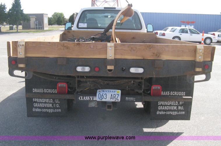 image for item B8133 2003 Ford F350 XL Super Duty flatbed pickup truck