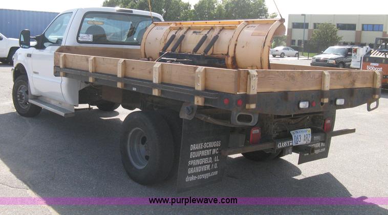 image for item B8133 2003 Ford F350 XL Super Duty flatbed pickup truck