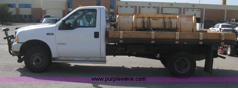 image for item B8133 2003 Ford F350 XL Super Duty flatbed pickup truck