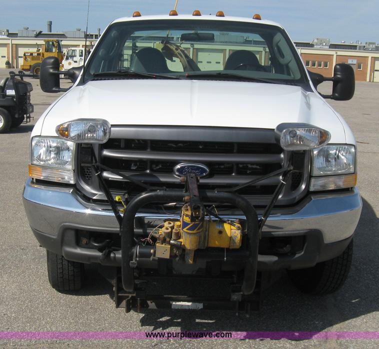 image for item B8133 2003 Ford F350 XL Super Duty flatbed pickup truck