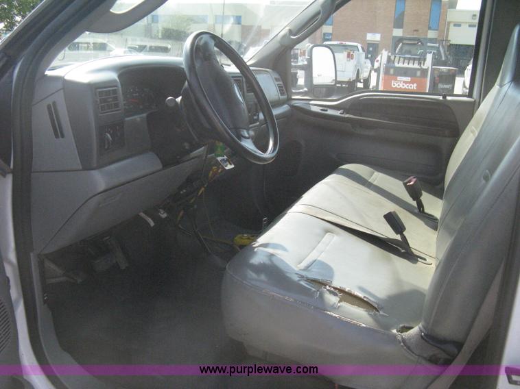 image for item B8133 2003 Ford F350 XL Super Duty flatbed pickup truck