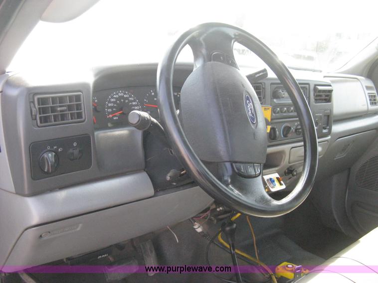 image for item B8133 2003 Ford F350 XL Super Duty flatbed pickup truck