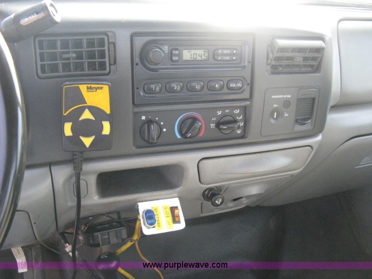 image for item B8133 2003 Ford F350 XL Super Duty flatbed pickup truck