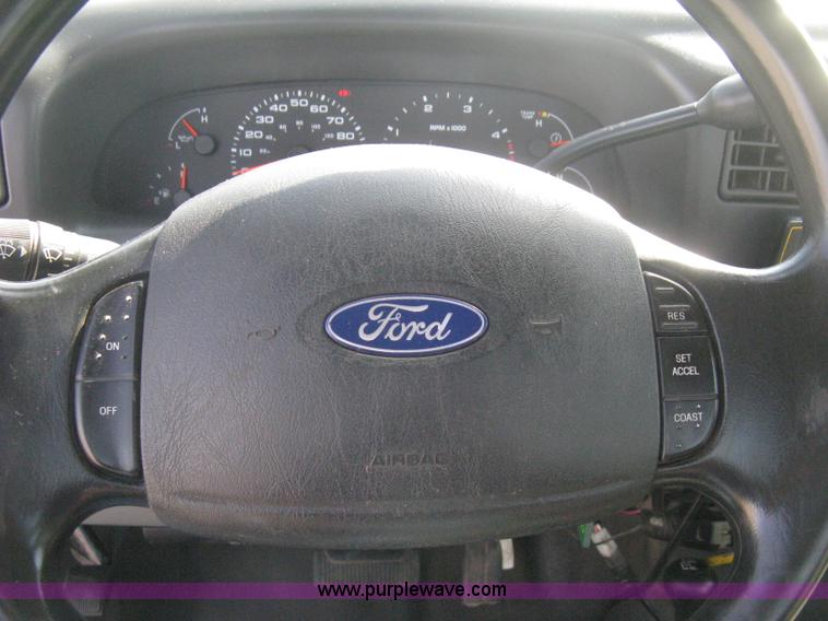 image for item B8133 2003 Ford F350 XL Super Duty flatbed pickup truck