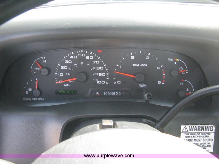 image for item B8133 2003 Ford F350 XL Super Duty flatbed pickup truck