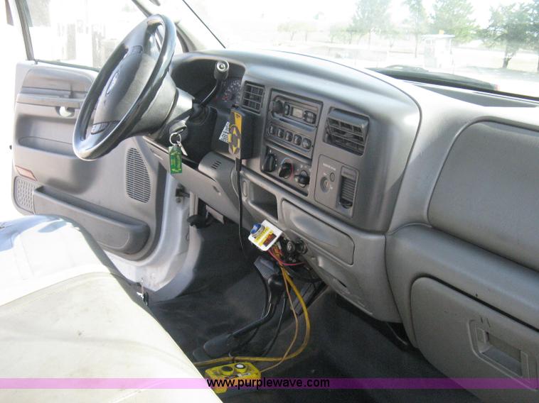 image for item B8133 2003 Ford F350 XL Super Duty flatbed pickup truck