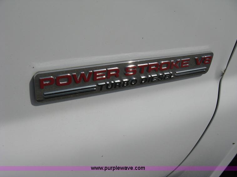 image for item B8133 2003 Ford F350 XL Super Duty flatbed pickup truck