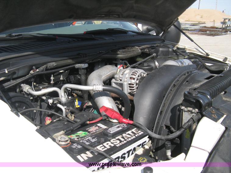 image for item B8133 2003 Ford F350 XL Super Duty flatbed pickup truck