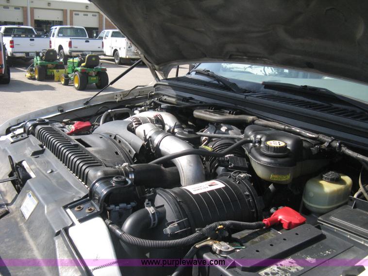 image for item B8133 2003 Ford F350 XL Super Duty flatbed pickup truck